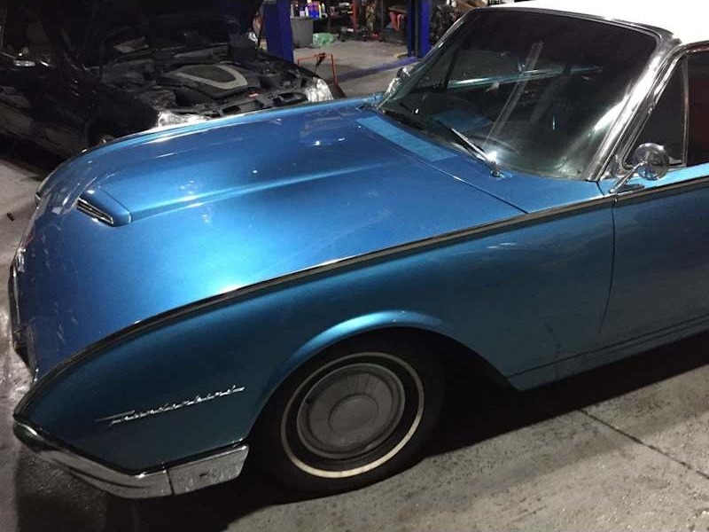 Paintwork on a classic car in the workshop