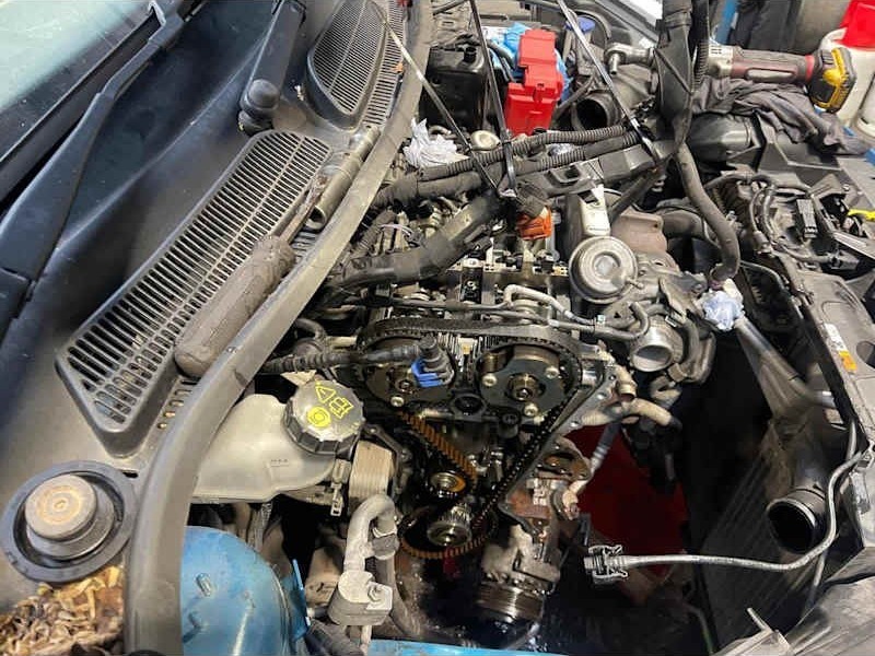 Engine bay open for repair in the workshop