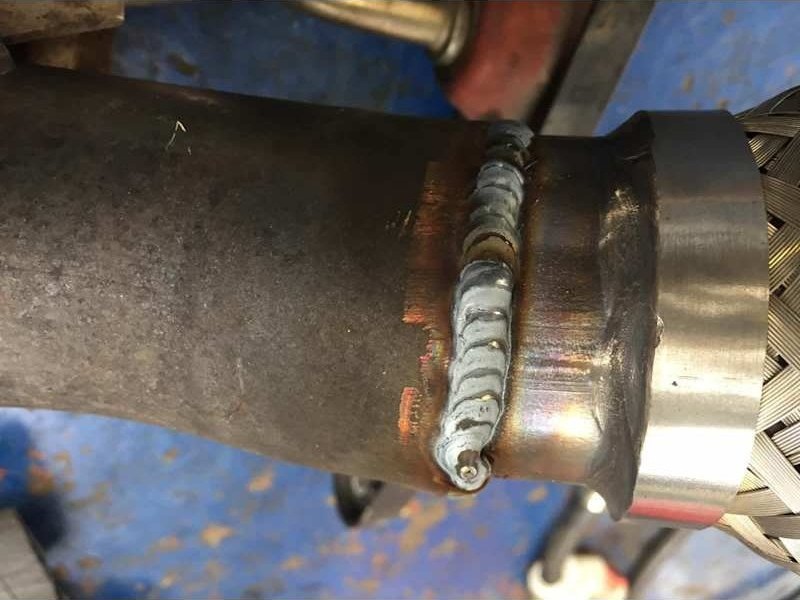 Exhaust joint being repaired