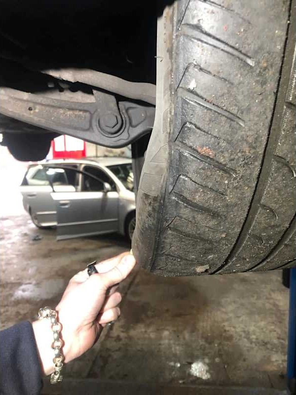 Tyre on a vehicle in the workshop bay
