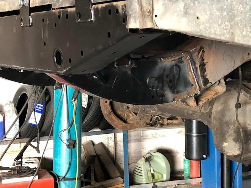Underside repair with the car on a lift