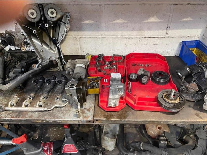 Workbench with tools and a parts tray