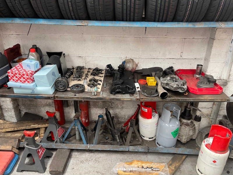 Workshop shelves with fluids and parts